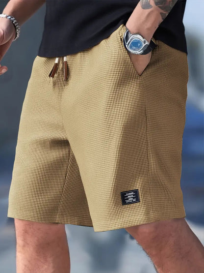 Pantalones cortos casuales de algodón para hombre